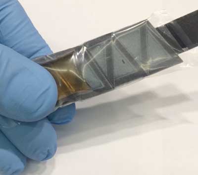 A foldable, biodegradable battery based on paper and bacteria