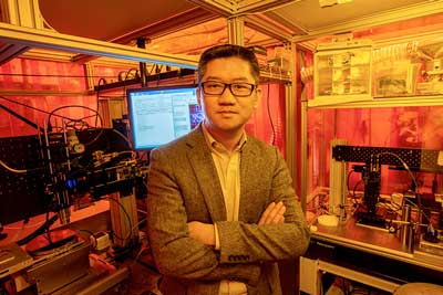 Dr. Heng Pan with his nanomanufacturing equipment