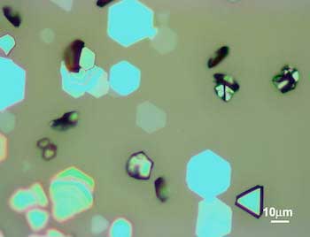 microscope image shows flakes of epsilon-iron(III) oxide grown on mica