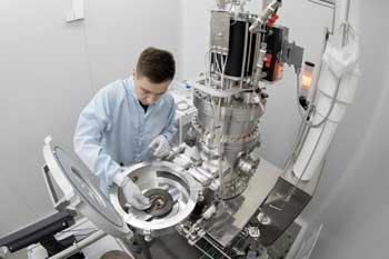 researchers  working with Atomic Layer Deposition