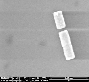 a pair of electromagnetically linked nanoparticles