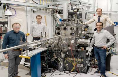 From left, Argonne and University of Chicago scientists Joseph Heremans, Samuel Whiteley, Martin Holt, and Gary Wolfowicz stand by Argonne’s Hard X-ray Nanoprobe beamline
