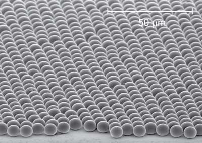 Scanning electron micrograph of a microscope slide coated with a colloidal crystal made of microspheres