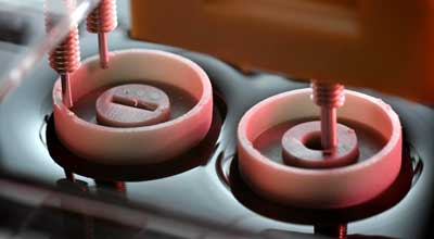 a custom built apparatus to measure the cheerios effect forces using magnetism
