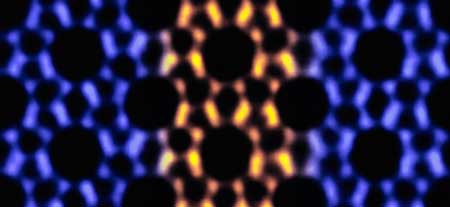This image shows atomic-scale details from transmission electron microscopy that reveals the porous structure of an MFI nanosheet, with MEL intergrown in it