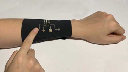 This sleeve incorporates the new electronic material, allowing it to function as a video game controller