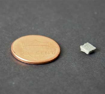 Nickel felt electrode compared to a penny