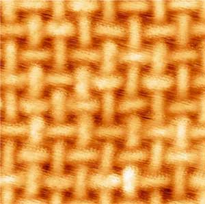 This scanning tunnelling microscopy image shows how iron atoms and organic molecules become ordered in patterns on a gold substrate