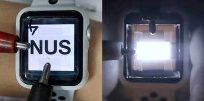 A transparent perovskite LED overlaid across a smart-watch display to show high optical transparency, neutral colour and bright NIR electroluminescence when turned on