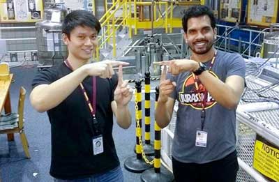 Doctoral students Phillip Dang (left) and Reet Chaudhuri at the National High Magnetic Field Laboratory