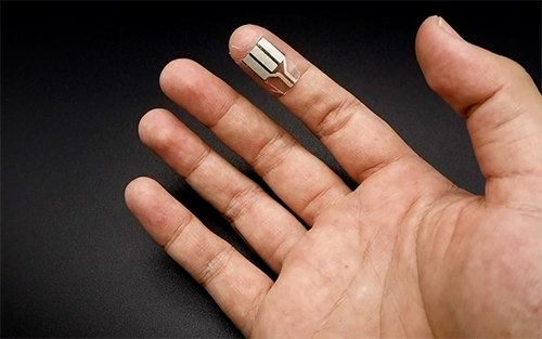 This thin, flexible strip can be worn on a fingertip and generate small amounts of electricity when a person’s finger sweats or presses on it.