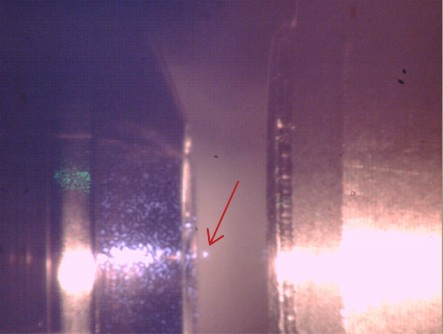 infrared image of the particle trapped in front of the microscope objective while in the quantum ground state
