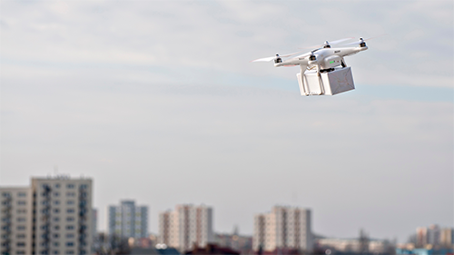 drone carrying a parcel