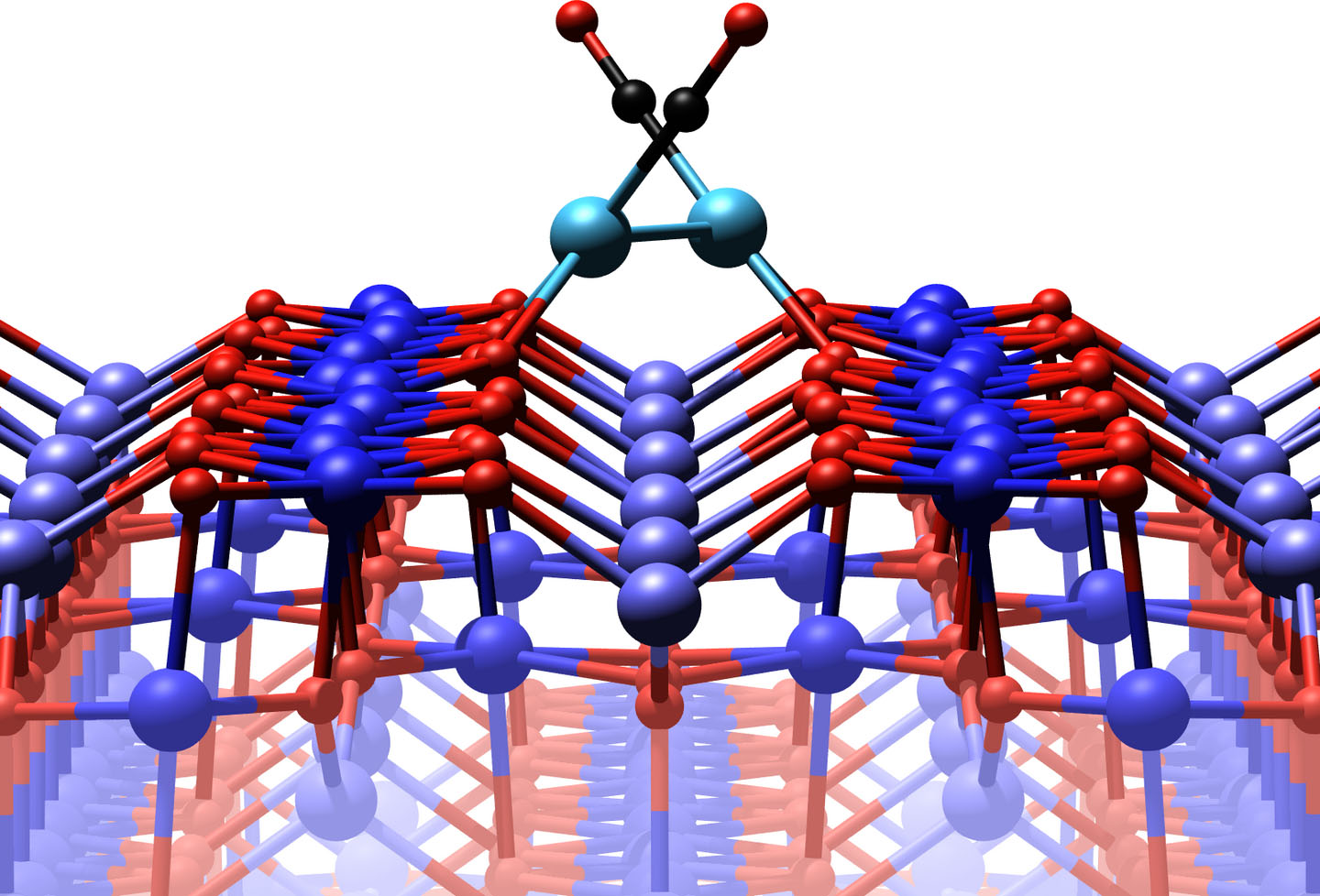 An iron oxide surface with two platinum atoms, each of which is attached to a carbon monoxide molecule