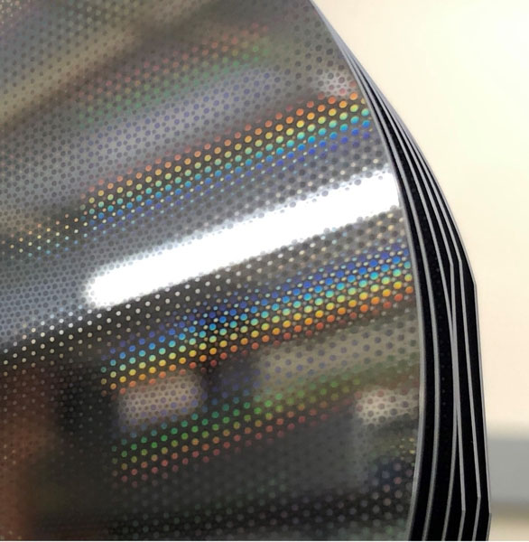 Silicon mirrors with stress correction patterns etched into a thermal oxide layer