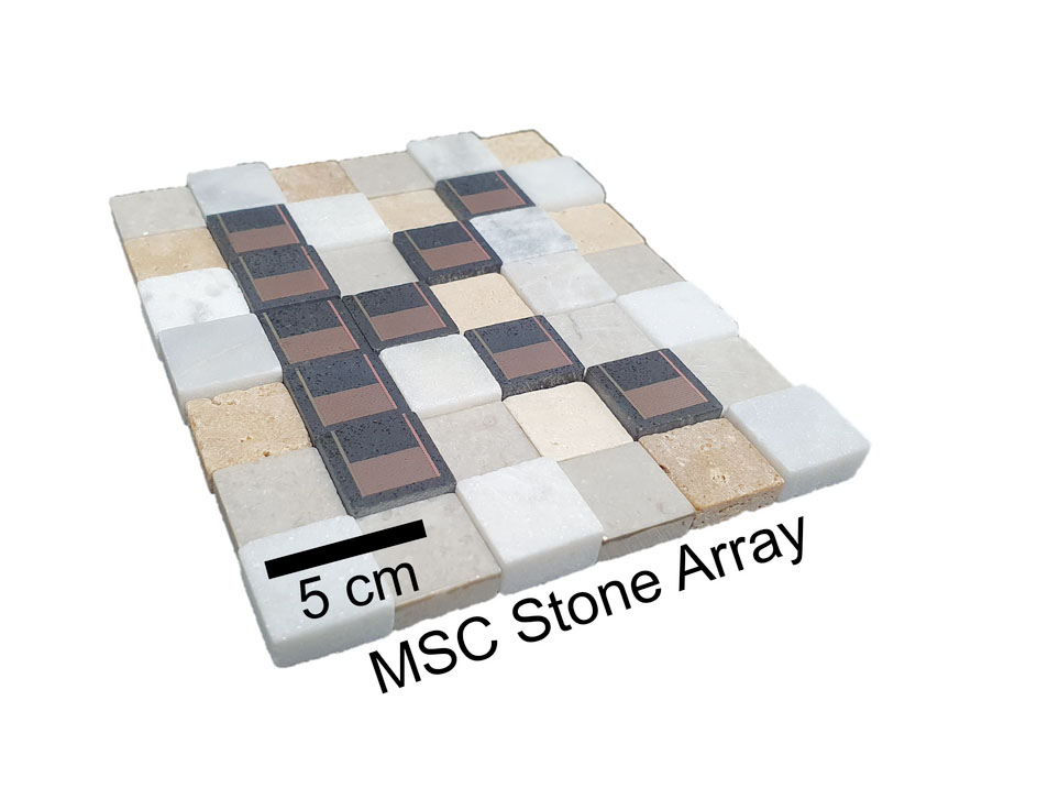 Interconnected microenergy devices built on marble tiles