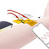 A wristwatch-style health monitor that operates without a battery