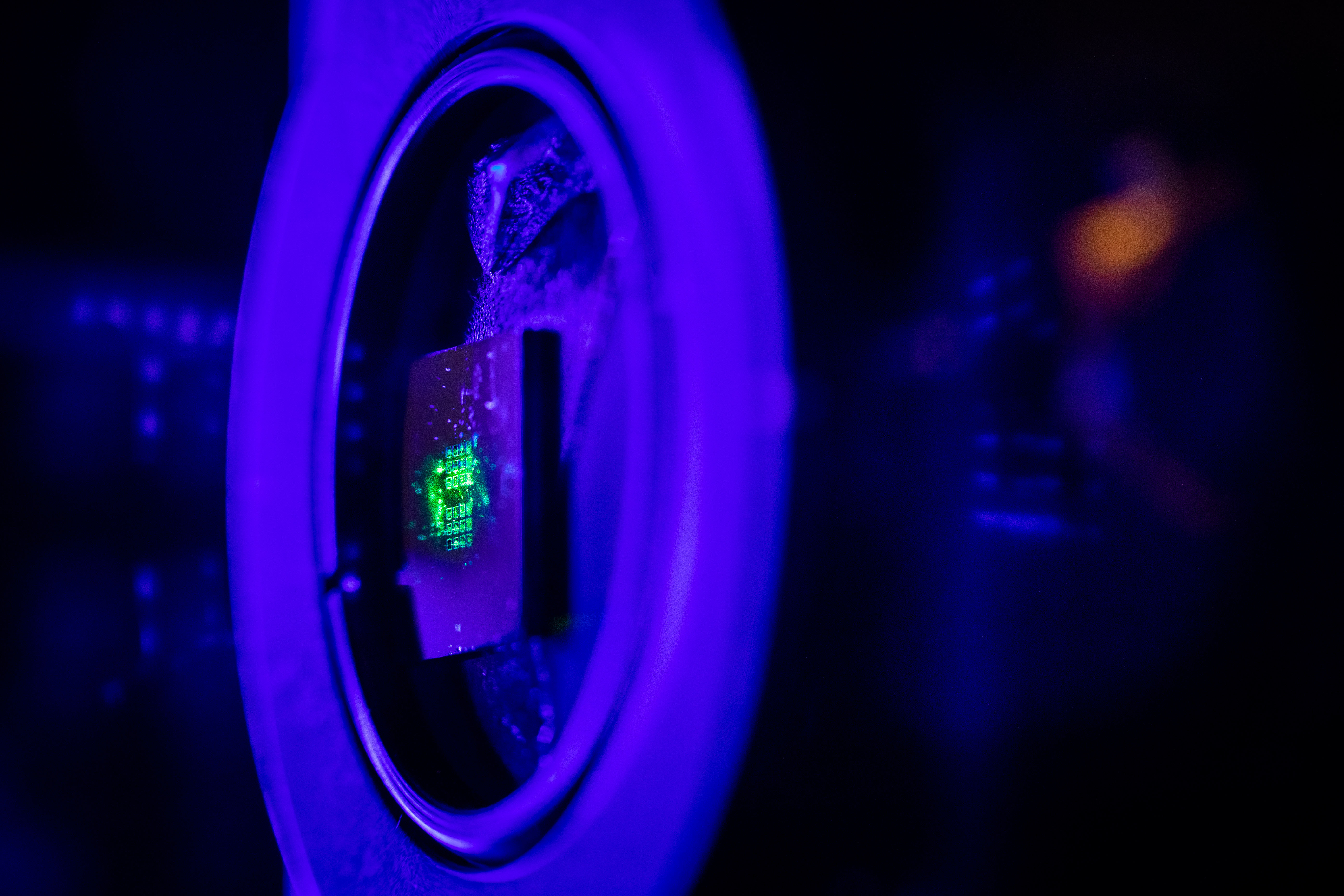Green laser light illuminates a metasurface