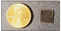 Size comparison of a US penny (left) and assembled microbattery (right)