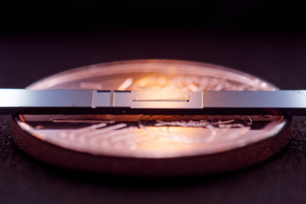 microchip with particle accelerator on a 1 cent coin