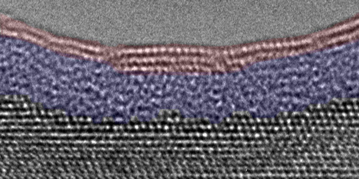 A transmission electron microscopy image of the oxidized aluminum surface shows that the passivating oxide film formed in water vapor consists of an inner amorphous aluminum oxide layer and an outer crystalline aluminum hydroxide layer