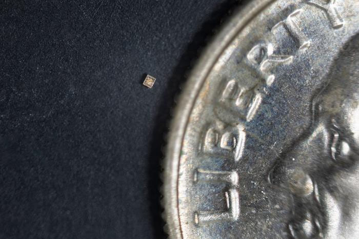 micro sensor compared to a coin