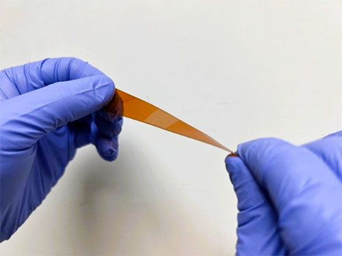 Pulse irradiation treated photodetector array on a polyimide substrate