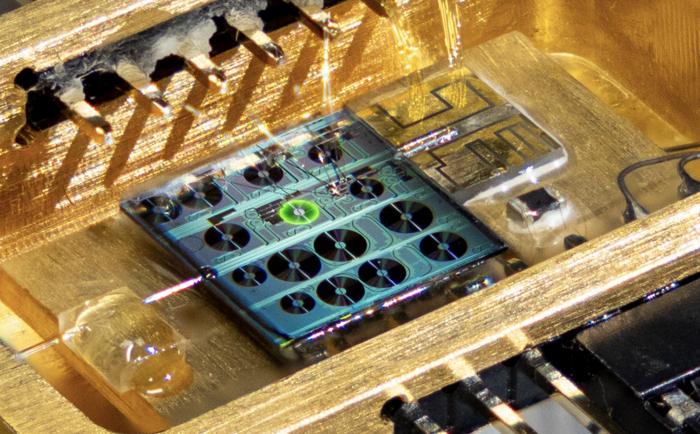 Optical image of a fully-packaged hybrid integrated erbium-laser based on silicon nitride photonic integrated circuit