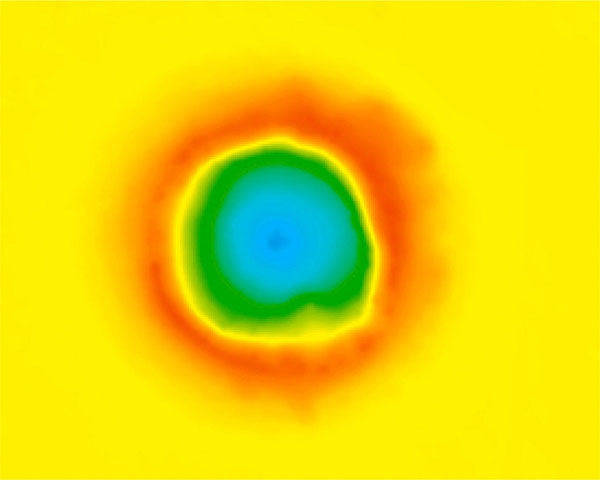 This laser confocal microscopy reconstruction shows the impression of a spherical microprojectile impact