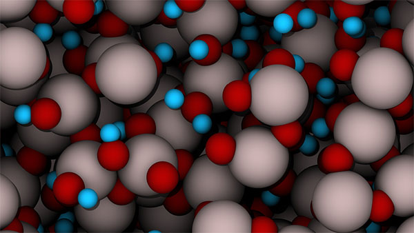In amorphous alumina, aluminum atoms (grey) and oxygen atoms (red) do not arrange in an ordered crystalline structure. The model also visualizes hydrogen atoms (blue) closely binding to neighboring oxygen atoms, which alters the material's properties.