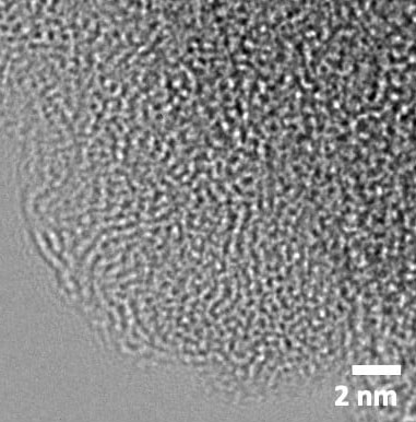 High-resolution TEM image reveals atomic-scale carbon layers grown on the zeolite framework after high-temperature CVD