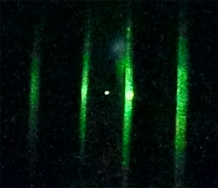 A single nanoparticle confined in a focused laser beam