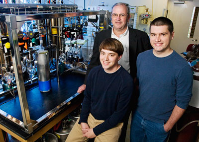 Chemistry professor Thomas B. Rauchfuss, center, and graduate students Bryan Barton, left, and Matthew Whaley