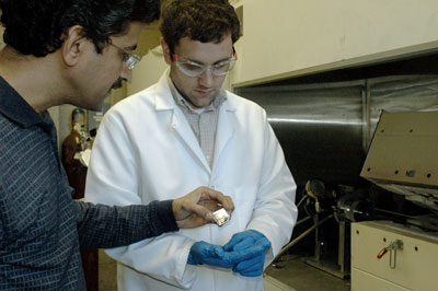 Dr. Apparao Rao and graduate student Jason Reppert assess the outcome of a nanotube synthesis procedure