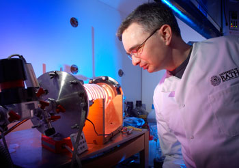 Dr Toby Jenkins uses a plasma reactor to coat the prototype dressings with the antibacterial nanocapsules