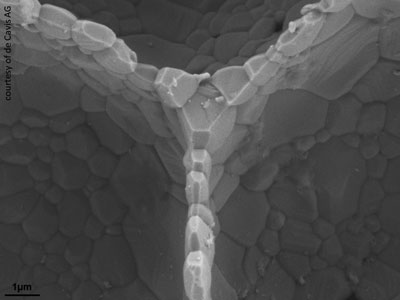 A scanning electron microscope photograph of a porous ceramic foam