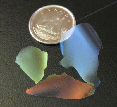 iridescent glass that can reflect UV or infrared light