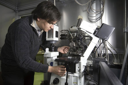 Meissl manually prepares the cell and sets up the incident direction of the ion beam