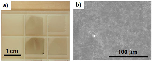 Graphene films on glass substrate. (a) Photograph and (b) SEM image