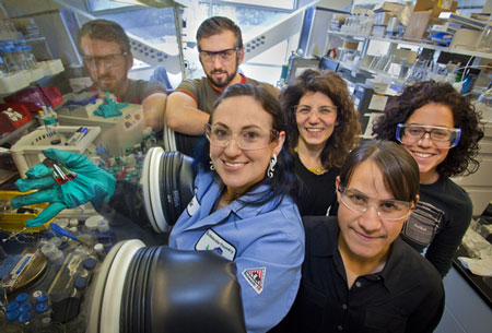 From left, Brett Helms, Evelyn Rosen, Raffaella Buonsanti, Delia Milliron and Anna Llordes at Berkeley Lab's Molecular Foundry with vials of bare surface nanocrystals