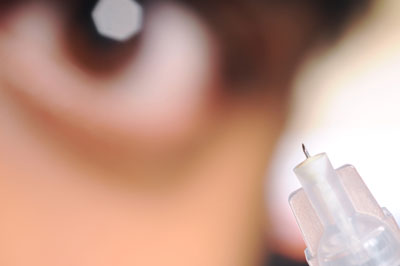 prototype microneedle used to inject therapeutics into specific locations in the eye