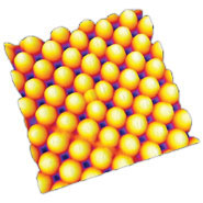 An array of 100 nanometre aluminium bumps on the surface of glass 