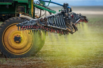 Herbicide is sprayed on a soybean field