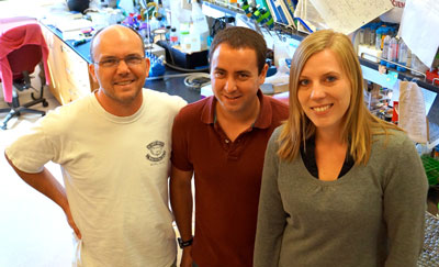 From left, Christopher Hayes, James Lamoureux, and Sanna Koskiniemi in the Hayes laboratory at UCSB