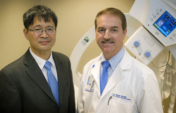 Dr. Liping Tang, left, bioengineering chair and professor, and Dr. Joseph Borrelli, chair of orthopedics for Texas Health Arlington Memorial