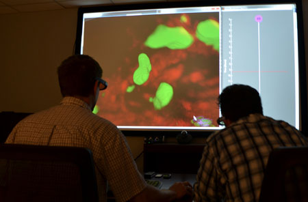 Andrew Cohen, PhD (right) and Eric Wait (left), are giving microbiologists an interactive look at the cells they're studying