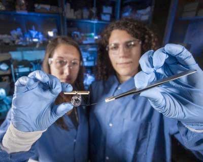 female researchers in lab coats