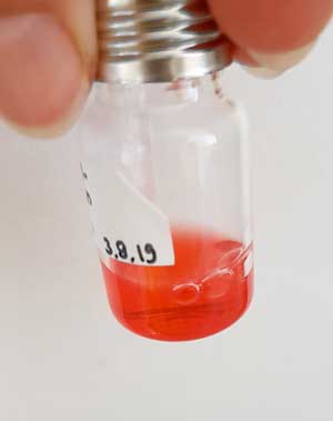 a vial of terpenoid dye
