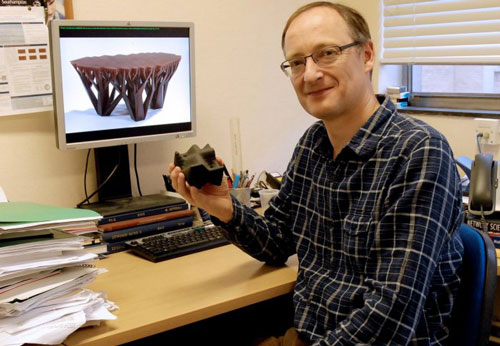 Dr Tim Evans with his 3D-pronted model of a forest fire