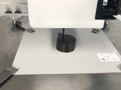 3D-printing a black cylinder with biopaste